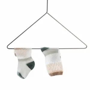 Breathable mesh baby socks for summer, thin and comfortable infant cotton socks hanging.