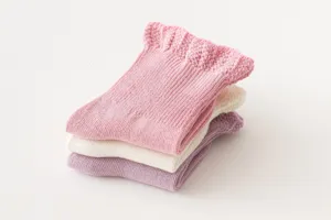 Details of cute baby cotton socks with ruffle cuffs, soft knit texture, 3-pack cute style.