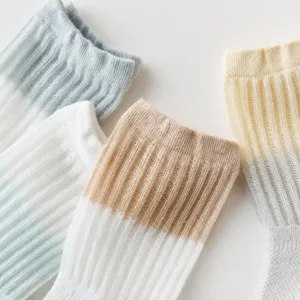 Breathable cotton baby socks with gradient color, soft mesh design for infants and toddlers.