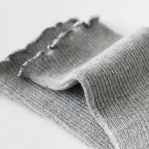 Grey ruffly knit mid-tube socks for children, comfortable cotton elastic baby socks.
