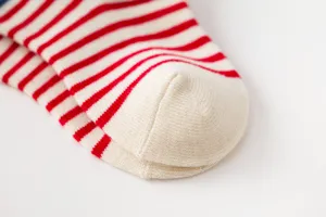 Kids red and white striped cotton socks detail view, soft and comfortable for daily wear.