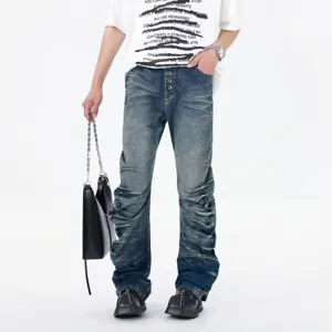 Stylish men's blue distressed washed stacked flare jeans with multi-button closure.