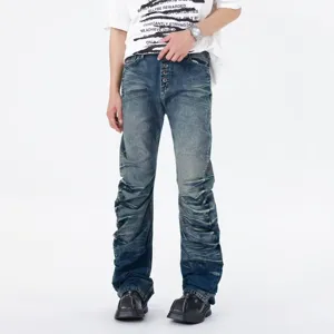 Men blue washed scrunched stacked flared jeans feature multi-button fly and pleated design.