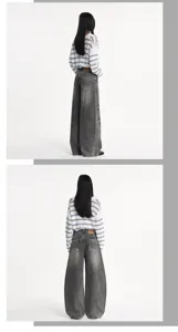 Vue détaillée arrière du jean large et incurvé en denim noir délavé vintage et souple.