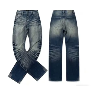 Men's vintage distressed stacked flared blue denim jeans with unique whiskered details.