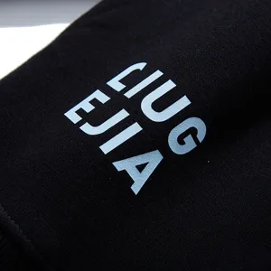 Men's black streetwear hoodie sweatshirt featuring stylish white letter print design detail.