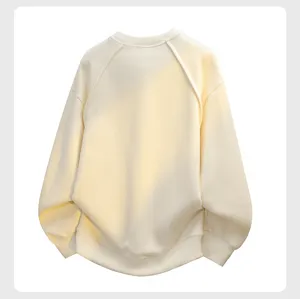 Close-up of men's casual crewneck waffle knit pullover sweatshirt in light yellow color.
