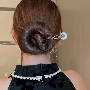 Exquisite Chinese style moon flower hair pin detail shot, perfect for elegant hair buns and hanfu.