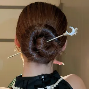 Elegant Chinese style metal hair stick with white crescent moon and flower for bun.