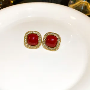Retro anchor red square crystal earrings detail view, showing exquisite golden metal and sparkling rhinestones close up.