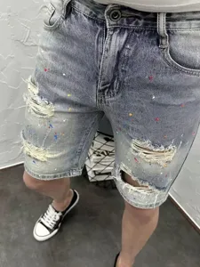 Men's denim shorts summer high street distressed paint splash casual five-point mid pants trendy