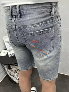 Men's casual distressed denim shorts summer high street fashion stretch half pants detail view