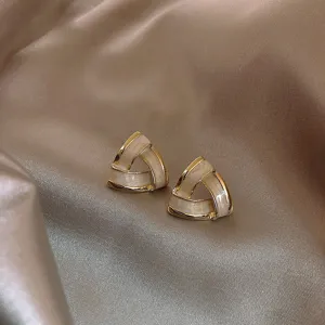 Fashion geometric triangle earrings, elegant metal gold-rimmed white resin ear studs for women.