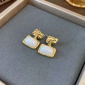 Chic gold-plated irregular geometric earrings with elegant white stone drop for women fashion jewelry