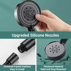 Pommeau de douche à main noir multimodage avec buses en silicone et raccord universel.