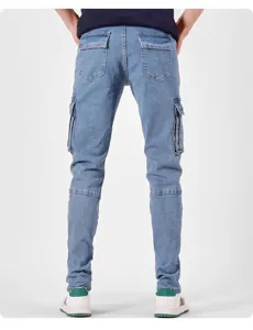 Detailed rear view of men's blue denim cargo pants with multiple utility pockets and slim fit.