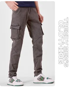 Detailed view of men's stretch grey cargo denim jeans with multiple functional pockets.