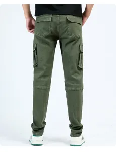 Back detail view of mens green cargo jeans showcasing multi pocket design and fit.
