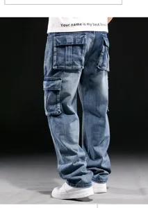 Detailed view of back utility pockets and wide leg fit on men's blue cargo denim jeans.