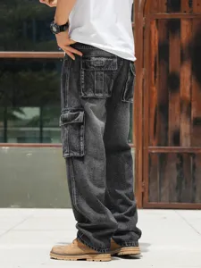 Back view detail of men's washed black loose cargo jeans with multi-pockets outdoors.