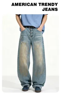 Men's American retro loose washed distressed wide leg jeans with unique metal dagger details.