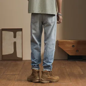 Men's Japanese loose tapered distressed gradient casual denim jeans detail shot showing back fit.