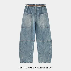 Mens vintage washed loose fit denim curved jeans casual streetwear trousers in blue color.