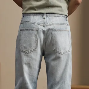 Men's light wash denim jeans casual slim fit straight leg pocket detailed back view apparel