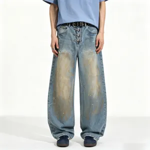 Men's loose fit washed distressed denim jeans with unique metal buckle and cool streetwear style.
