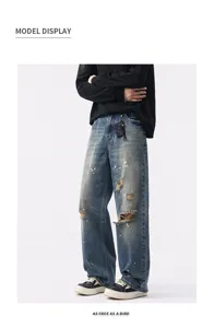 Men's vintage washed wide-leg blue jeans, heavy distressed straight loose casual denim trousers.
