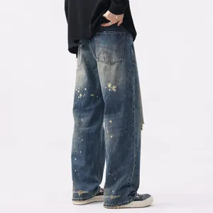 Vintage washed wide leg blue jeans for men, retro distressed straight casual denim trousers.