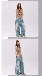 Detail shot of distressed washed vintage asymmetric patchwork jeans and chic sleeveless tank top.