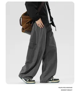 Detail view of American retro curved casual pants, loose wide-leg drape denim jeans stylish.