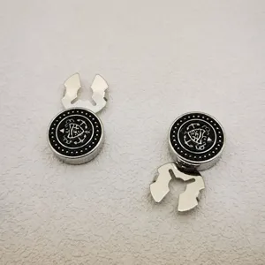 Vintage metal buttons detail shot, exquisite anchor and skull pattern for stylish cardigans.