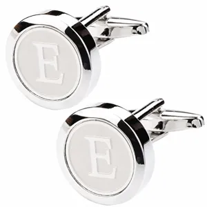 Close-up detail of silver-toned metal round French shirt cufflinks featuring letter E design.