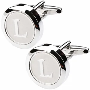 Detailed view of silver metal round French shirt cufflink engraved with letter L clearly.