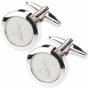 Detailed view of silver-tone round metal cufflinks featuring an engraved letter X design.