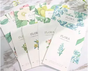 Vintage botanical stationery set with floral envelopes for romantic letters and writing.