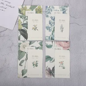 Vintage botanical stationery and envelope set with elegant flower illustrations for writing.