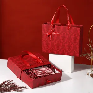 Scatola regalo di lusso rossa con manico in nastro, elegante design a cassetto per matrimoni.
