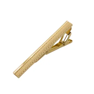 Gold textured tie clip for men, elegant business metal suit accessory for office wear.