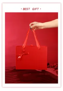 Boîte cadeau rouge avec ruban et poignée, idéale pour bijoux, rouge à lèvres et fêtes.