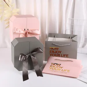 Creative pink octagonal gift box set with ribbon for wedding, birthday and cosmetics packaging.
