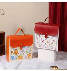 Leather gift box with handle floral pattern elegant packaging box for birthday party favors.