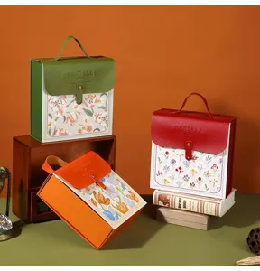 Leather gift box packaging set with floral pattern, portable handle design for birthday.