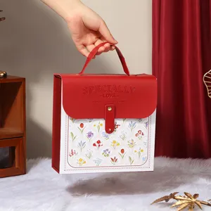 Red leather gift box, handheld flower pattern packaging box for birthday parties and wedding favors.