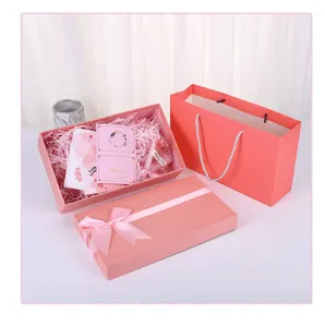 Pink gift box set with bow, elegant packaging box with handle bag and greeting cards.