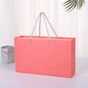 Pink gift box for birthday party and cosmetic packaging present celebration events