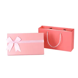 Pink gift box with satin bow and matching paper bag for birthdays and party events!