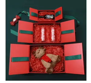 Christmas red gift box set with green ribbon and festive fill, ideal for holiday packaging.